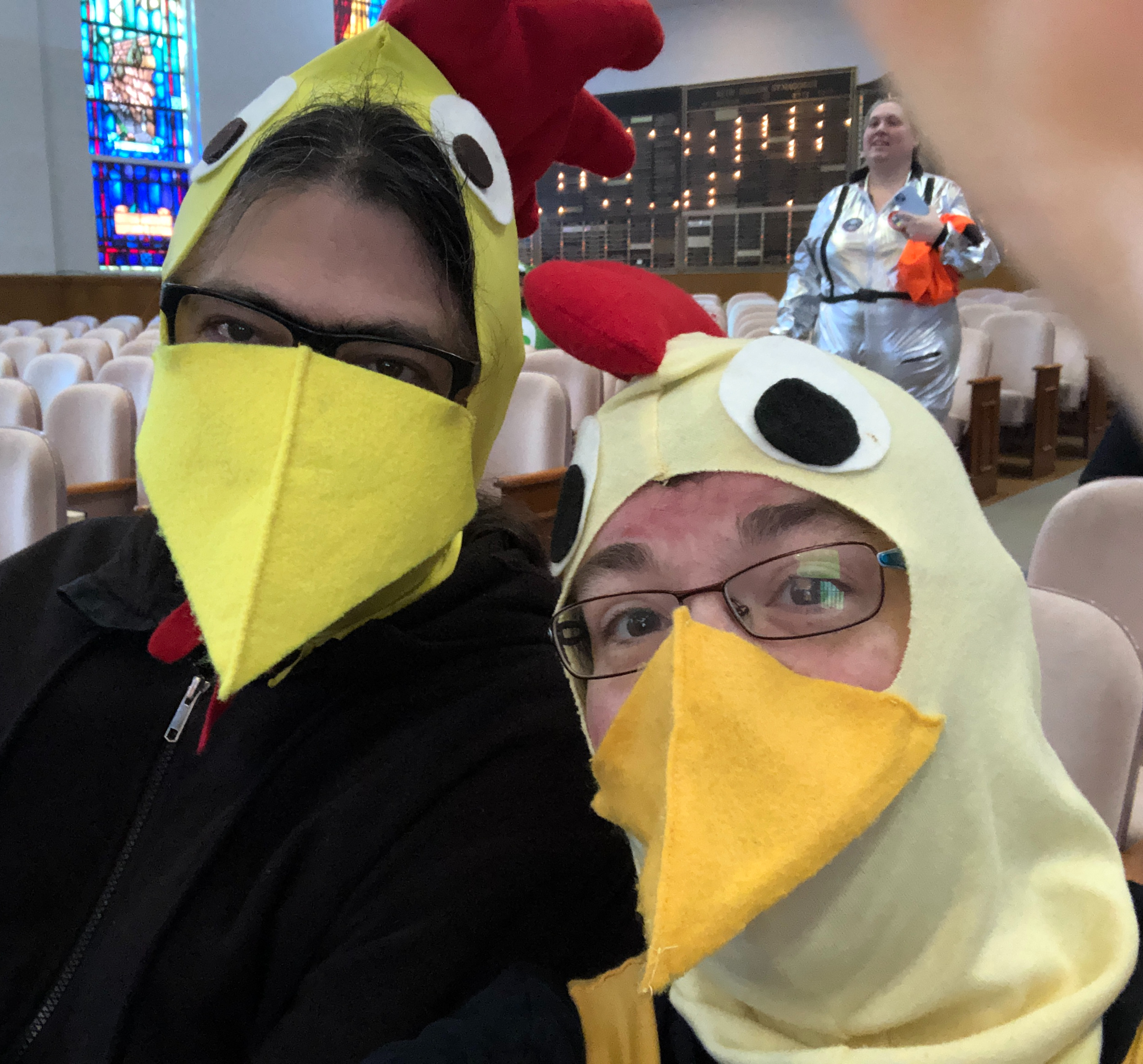 Selfie of me and Mr. December both wearing chicken costumes.
